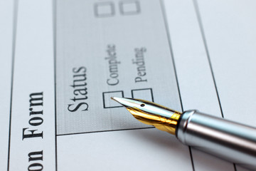 Fototapeta premium Application form status and pen closeup 