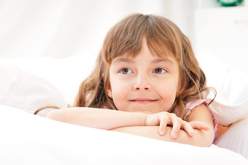 Girl awaked up in bed