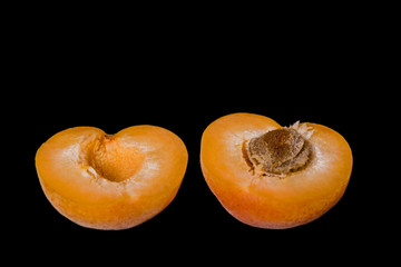 Apricot fruit isolated on black background