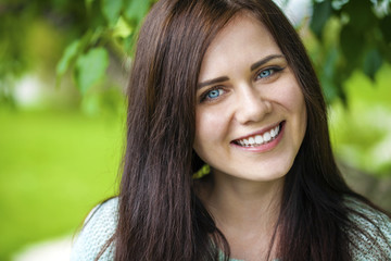 Portrait of beautiful young happy woman