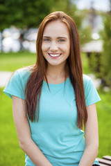 Portrait of beautiful young happy woman