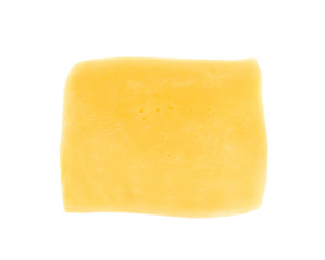 Yellow cheese slice on white background