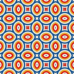 Bright ethnic abstract background. Seamless pattern with symmetric geometric ornament.