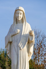 Fototapeta premium Statue Of Holy Mary Of Medjugorje - apparition hill