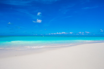 Beautiful white sand beach and turquoise clean water on tropical exotic island