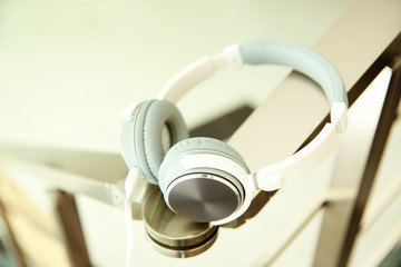 Headphones on the edge of the chair, closeup
