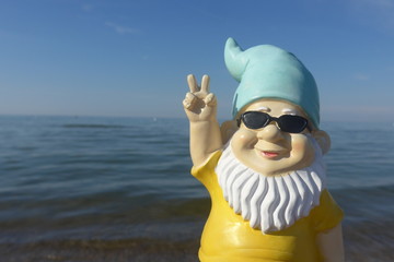 Garden gnome on vacation at sea 