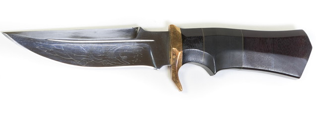 Beautiful hunting knife against white background