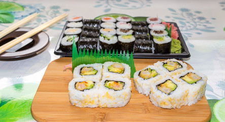 Various kinds of fresh sushi on the table