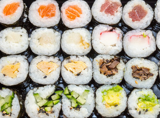 Various kinds of fresh sushi on the table
