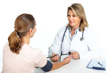 Doctor woman measuring patient blood pressure.