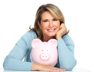 Senior woman with a piggy bank.