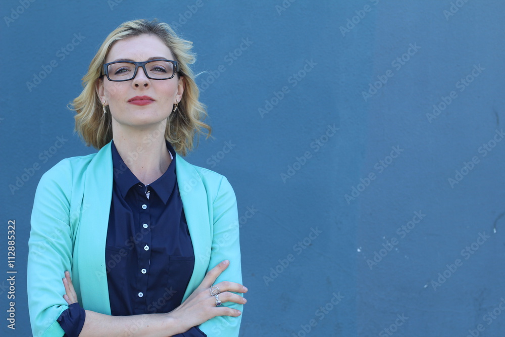 Wall mural successful businesswoman in suit with arrogant expression