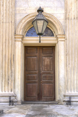 Wooden Door in Marble Entry