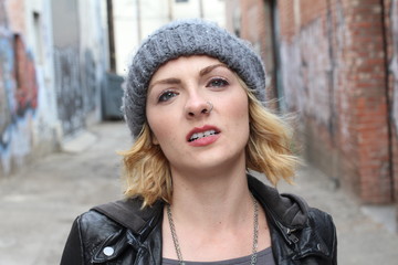 Aggression. Unkind Crazy Woman Rocker Showing Attitude. Provocation Concept