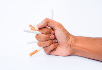 Male hand crushing cigarette,world no tobacco day concept