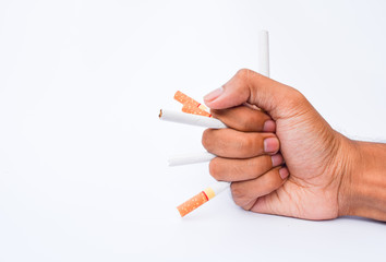 Male hand crushing cigarette,world no tobacco day concept