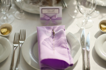 Table setting with lavender flowers, close-up