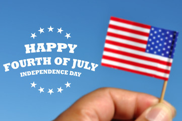 Happy Fourth of July greeting card with american flag in blue sky background - 112887317