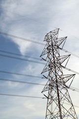 Electricity post on blue sky background in evening day.
