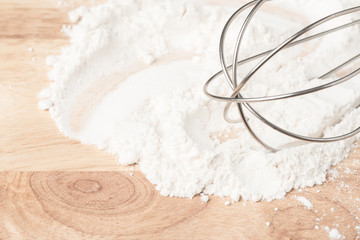 Flour and whisk prepare for cooking or baking