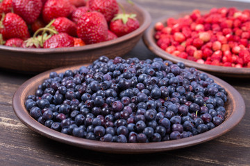 Fresh strawberries and blueberries , wild berry.