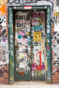Graffiti covered doorway in New York City