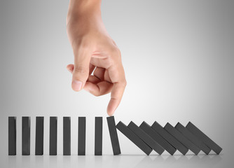 hand stop  dominoes continuous toppled