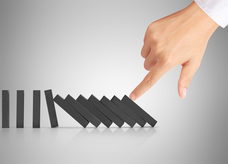 hand stop  dominoes continuous toppled