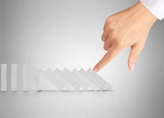 hand stop  dominoes continuous toppled