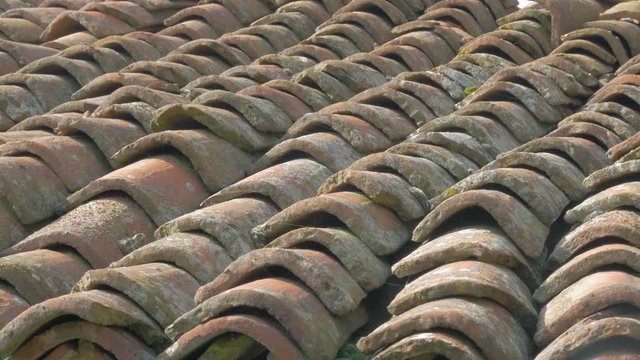 Dirty old type roof type texture slow pan 4K 3840X2160 30fps UltraHD footage - Slow panning over ancient rooftop clay cover 4K 2160p UHD video