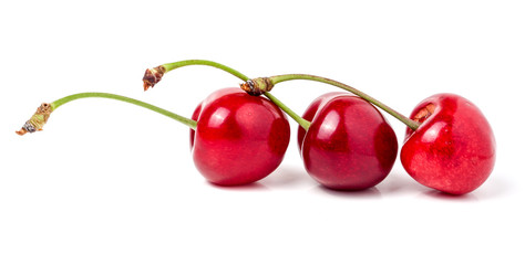 Three sweet cherry closeup isolated on white background