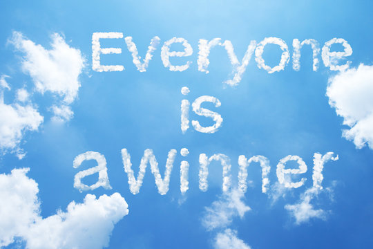 "Everyone is a Winner" cloud word on sky.