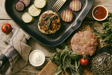 Preparing black burger and ingredients