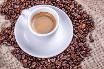 Cup and coffee beans