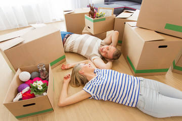 Happy couple moving into new apartment
