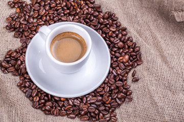 Cup and coffee beans