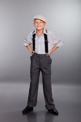 Old fashioned boy looking to the camera