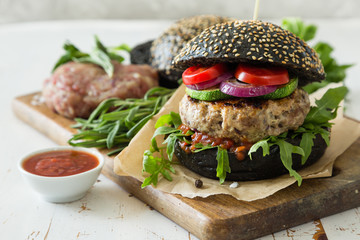 Black burger and ingredients