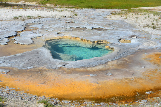 Hot geyser pool in Old Faithful area
