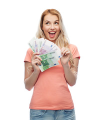 happy young woman with euro cash money