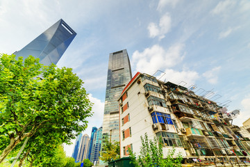 Old buildings coexist with modern skyscrapers in Shanghai, China