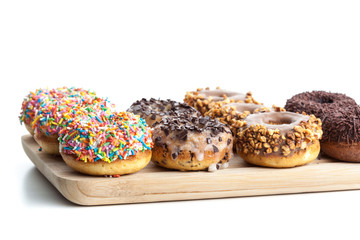 Donuts on wood plate