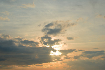 Naklejka na ściany i meble Sky with clouds at sunset background