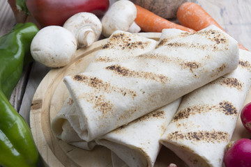 tortilla wraps with meat and vegetables