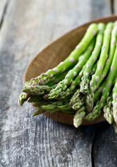 asparagus on wooden surface