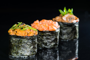 macro gunkan on a black background with reflection © smspsy