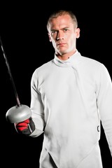 Swordsman holding fencing sword
