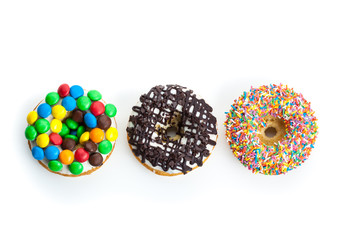 various donuts on white background