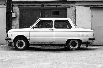 old car on the background wall of a building